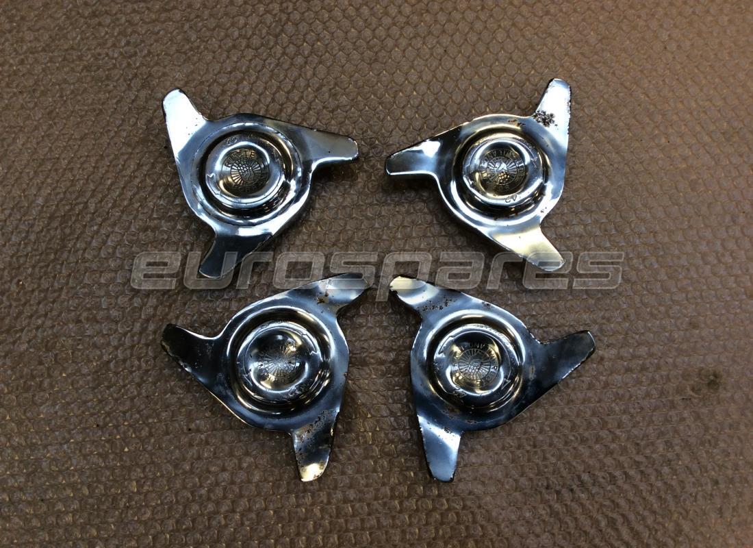 used maserati wheel spinners set (42 mm). part number mc8798 (1)