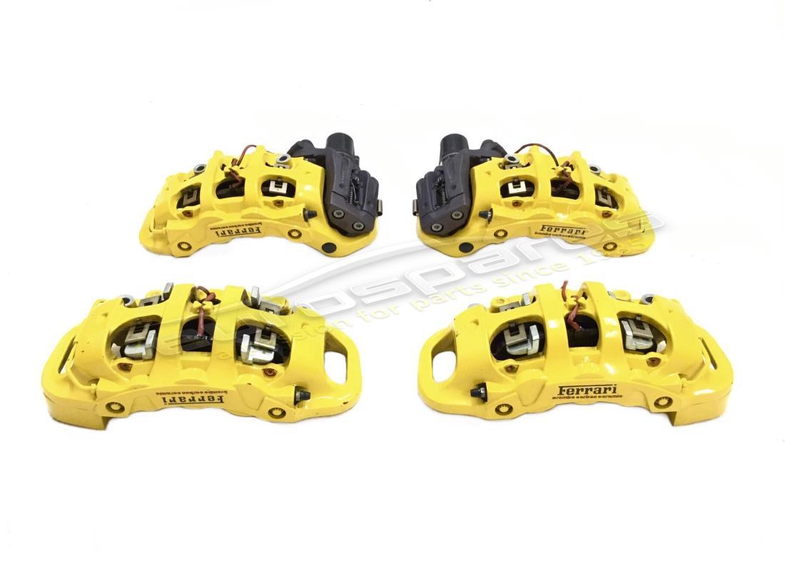 used ferrari yellow calipers set (4 pcs). part number 309264000 (1)