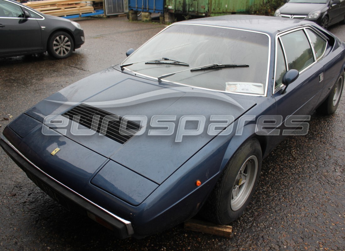 ferrari 308 gt4 dino (1979) being prepared for dismantling at eurospares