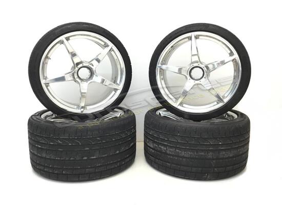 used ferrari black rims set part number 70003494