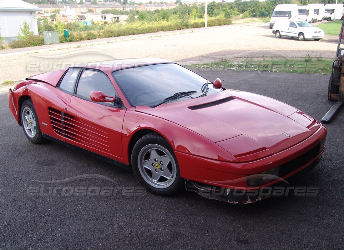 ferrari testarossa (1990) being prepared for dismantling at eurospares