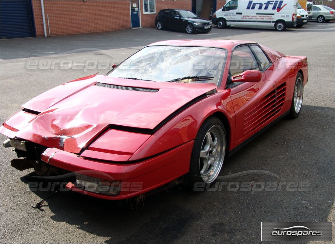 ferrari testarossa (1990) being prepared for dismantling at eurospares