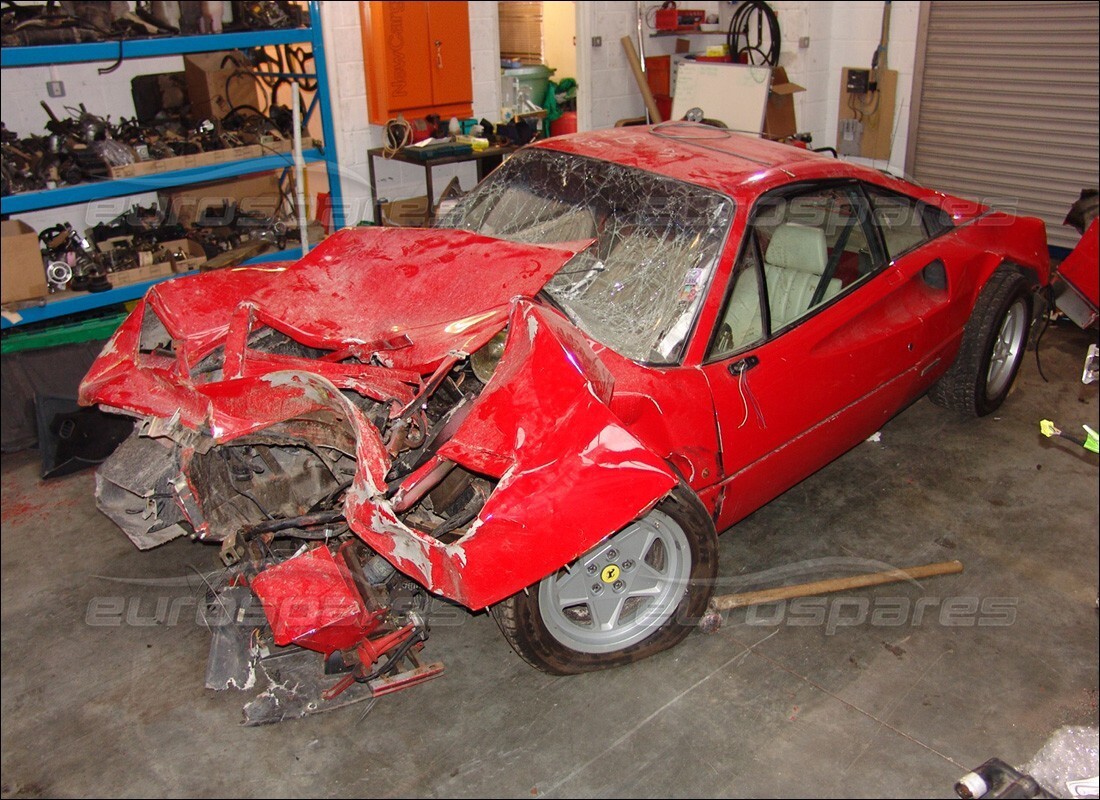 ferrari 328 (1985) with 25,374 miles, being prepared for dismantling #1